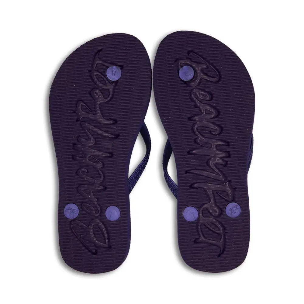Pair of navy blue BeachyFeet® flip flops with textured sole and logo embossed on the bottom for men’s beachwear