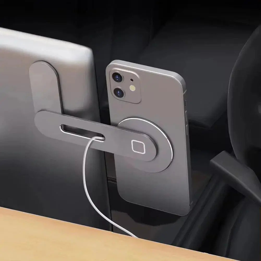Metal Expansion Phone Stand attached to a laptop with magnetic folding phone holder and charging cable connected to phone