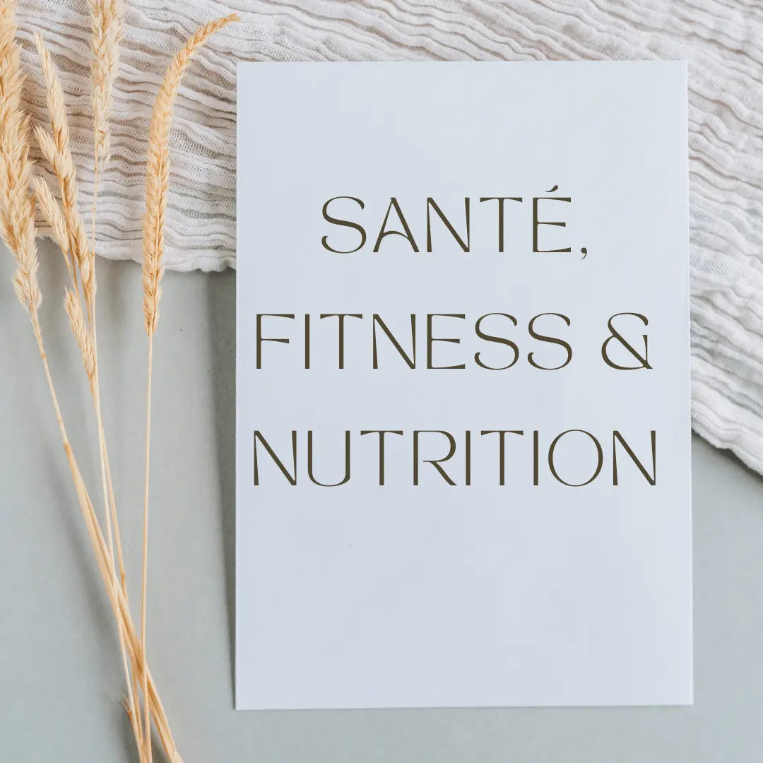 White card with Santé, Fitness & Nutrition text placed on grey fabric background next to dried wheat stalks