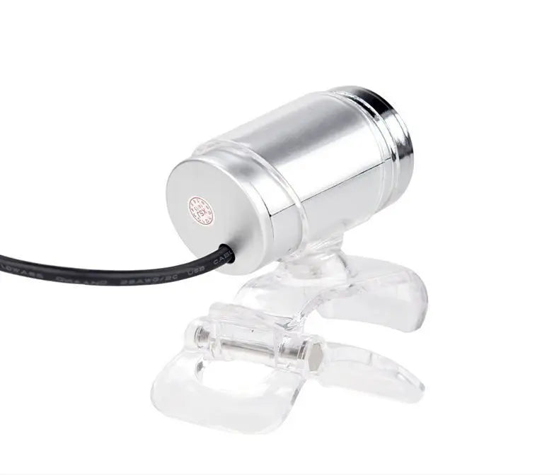 Compact silver 480P HD camera with USB cable, mounted on transparent clip stand for easy attachment