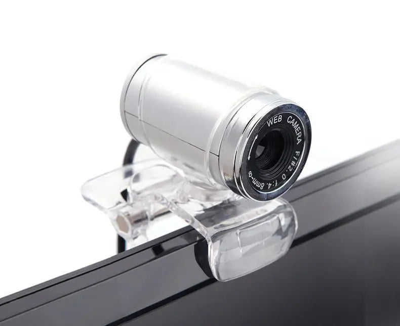 Compact silver 480P HD webcam with 640x480 resolution and clip mount attached to monitor edge
