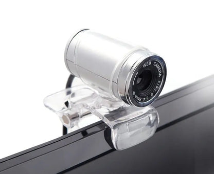 Compact silver 480P HD webcam with 640x480 resolution and clip mount attached to monitor edge