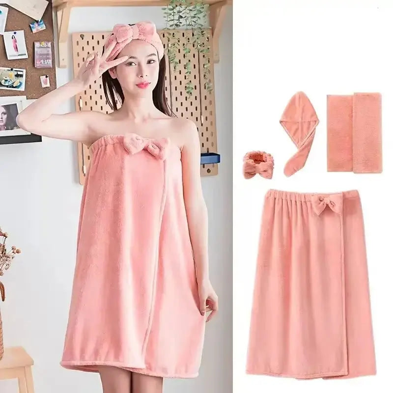 Woman wearing pink microfiber bath towel dress with matching hair wrap set including headband, towel, and face cloths
