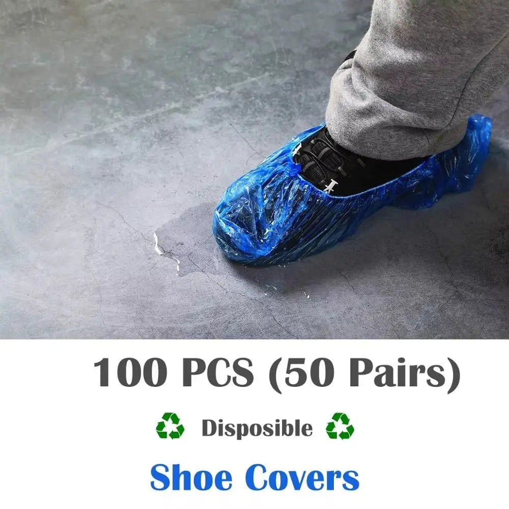 Close-up of foot wearing blue disposable shoe cover on waterproof floor demonstrating protective overshoes use
