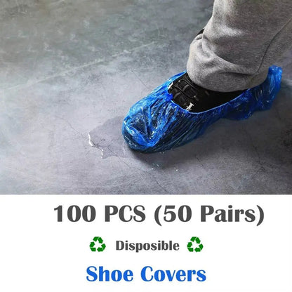 Close-up of foot wearing blue disposable shoe cover on waterproof floor demonstrating protective overshoes use