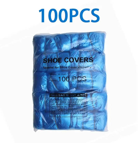 Pack of 100 blue disposable shoe covers designed for use with automatic shoe cover dispenser machines