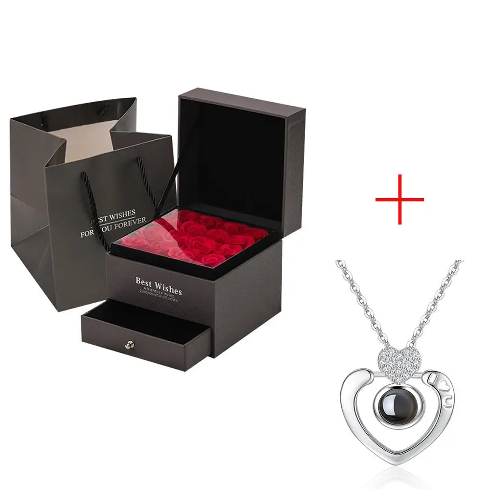 Gift set with black box of preserved red roses and silver heart pendant necklace for Valentine's Day