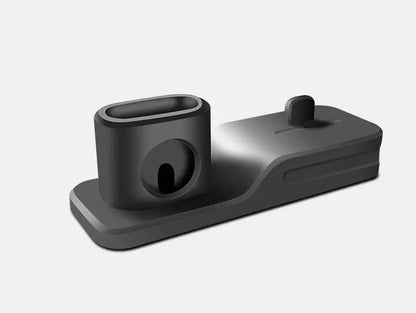 Black 3-in-1 mobile charging base stand compatible with Apple iWatch, AirPods, and iPhone devices on grey background
