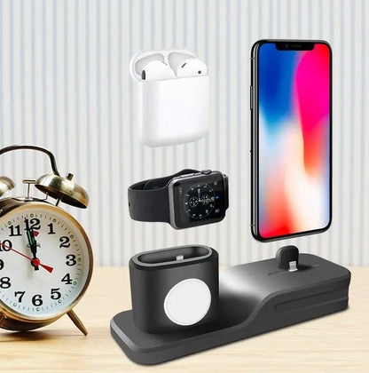 Black 3-in-1 mobile phone charging base with iPhone, AirPods, and iWatch charging stands on wooden surface