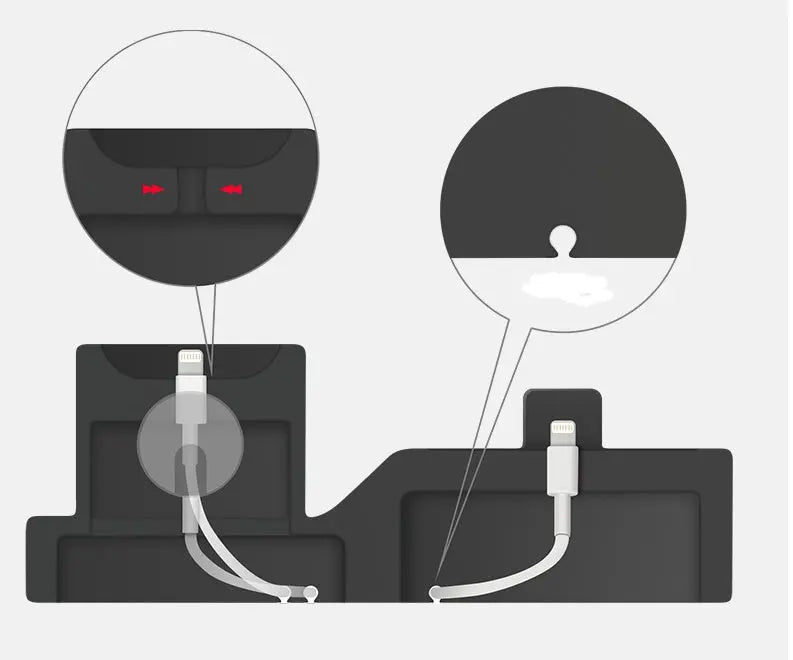 Close-up of black 3-in-1 mobile phone charging base showing cable management details for Apple device connectors