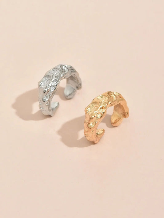 Pair of creative ladies wear fashion alloy earrings in textured silver and gold-tone with open-ended design