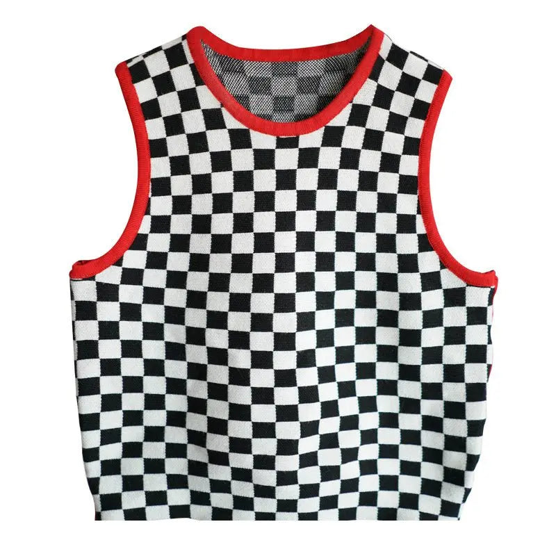 Front view of sleeveless crop top with black and white damier pattern and red trim around neckline and armholes