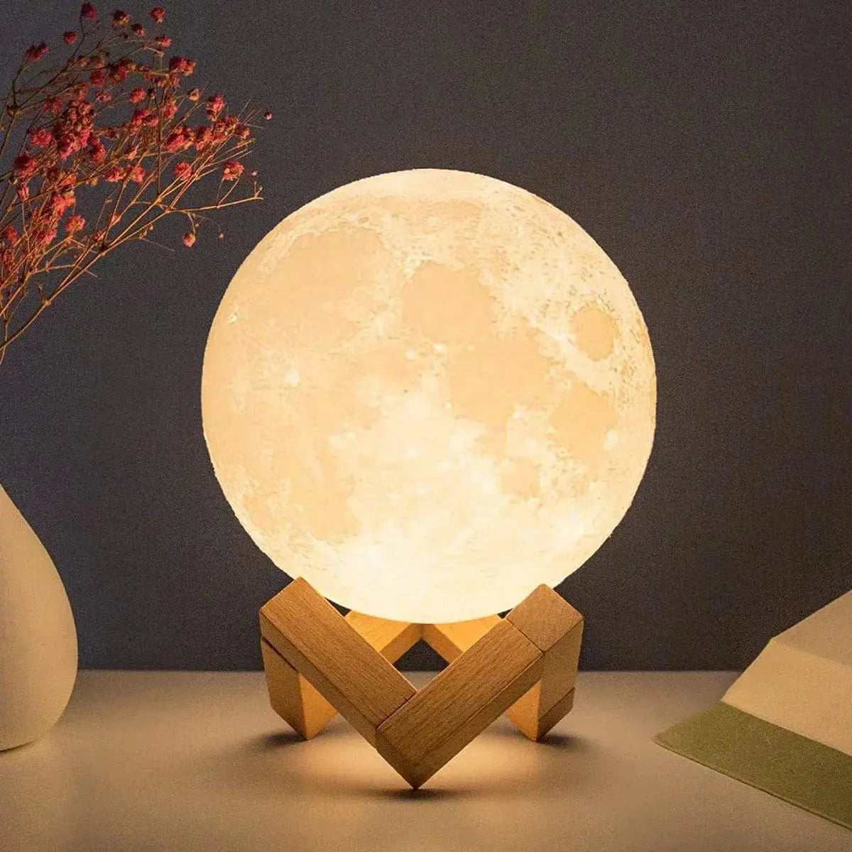 D5 Starry Moon Lamp 8cm glowing with detailed lunar surface on wooden stand, ideal for bedroom decor and gifts