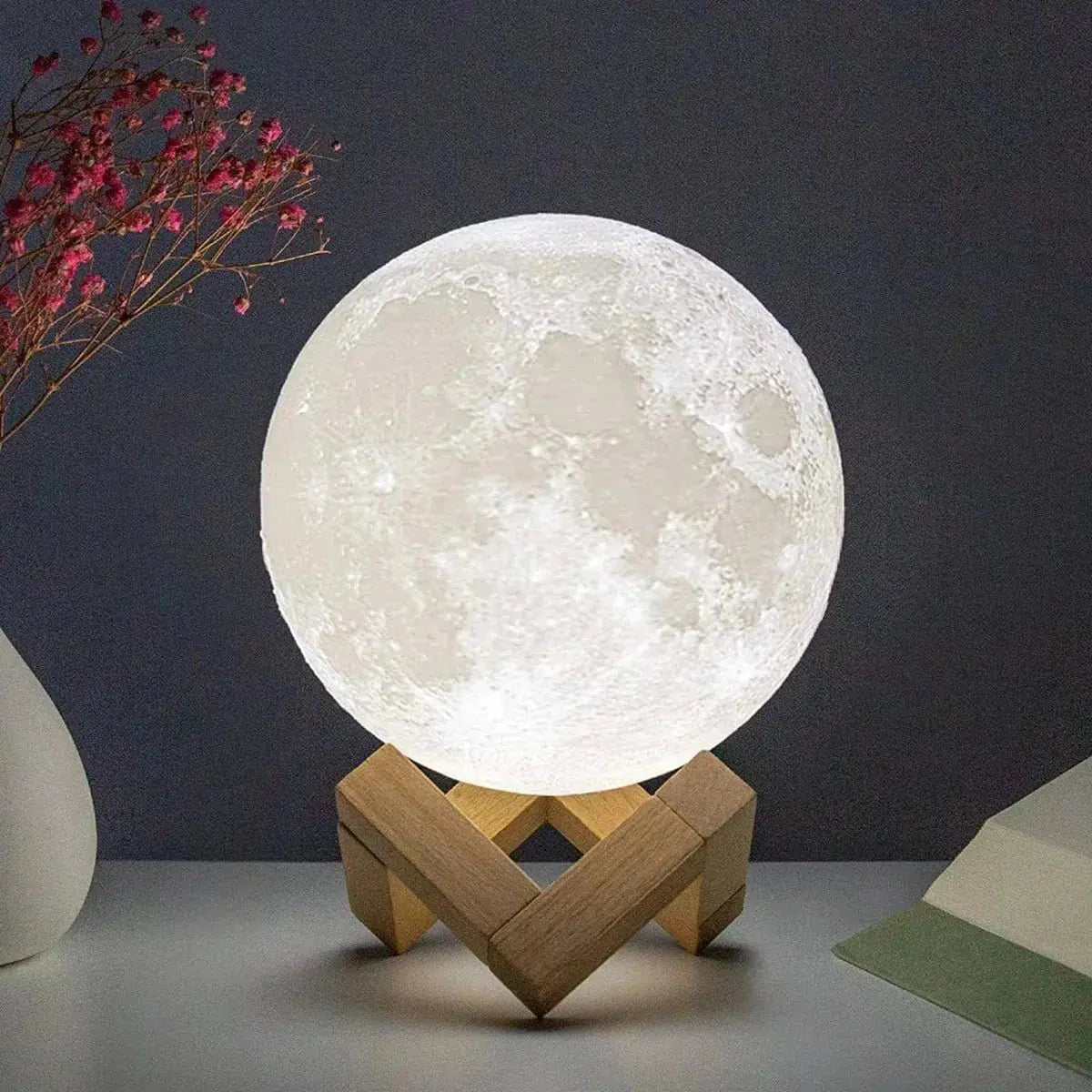 D5 Starry Moon Lamp 8cm glowing white with detailed lunar surface on wooden stand for bedroom decoration