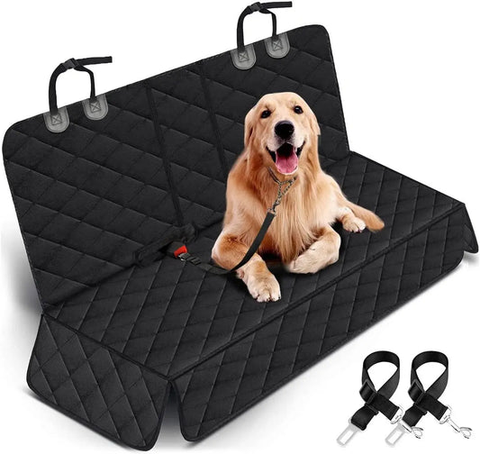 Black quilted dog car seat cover with straps and a leash attached, protecting back car bench seat