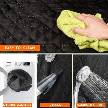 Close-up of black quilted waterproof dog car seat cover being wiped clean with green cloth, showing easy maintenance features