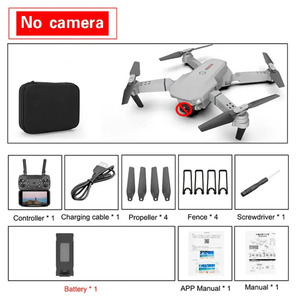 Folded grey E88 Pro quadcopter drone without camera and included accessories laid out with controller and manuals