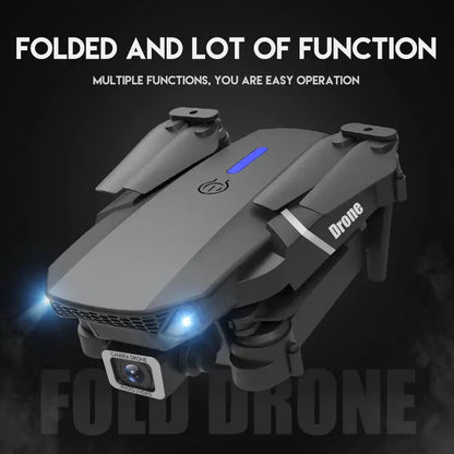 Folded E88 Pro quadcopter drone with HD 4K camera and LED lights displayed on dark background