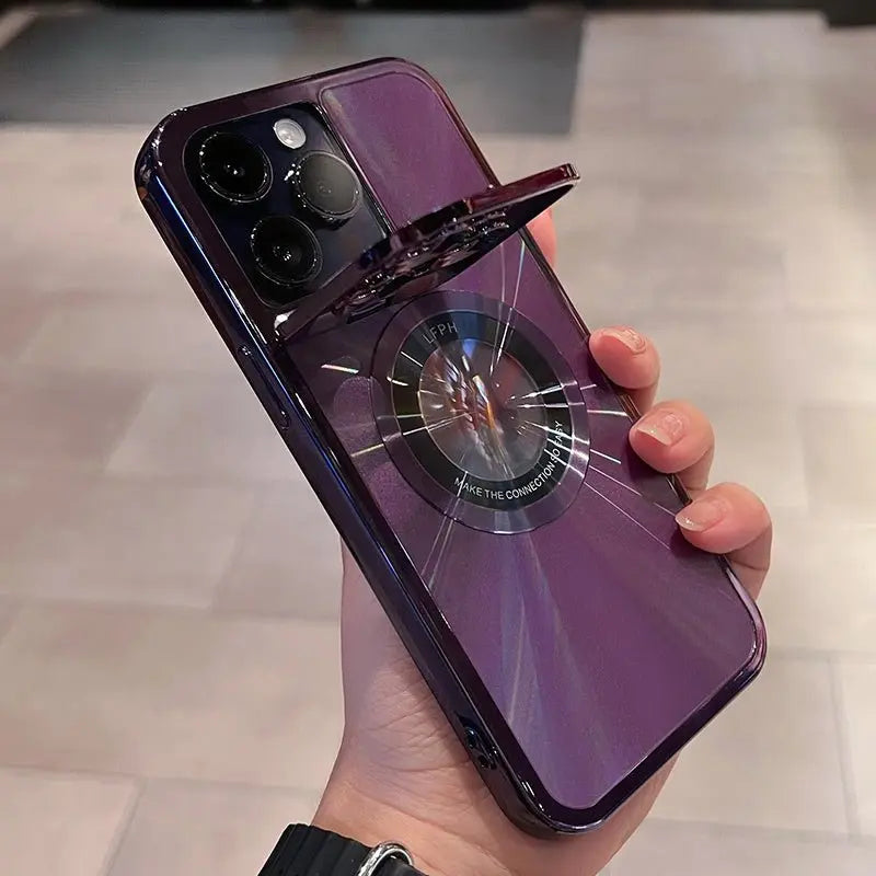 Hand holding purple electroplated phone case with CD pattern, magnetic bracket, and raised camera lens holder for iPhone Pro Max