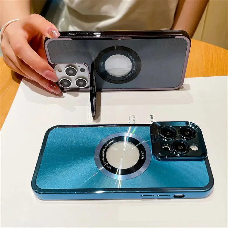 Close-up of two electroplated phone cases with CD pattern and magnetic Magsafe bracket for iPhone 12 13 14 Pro Max models