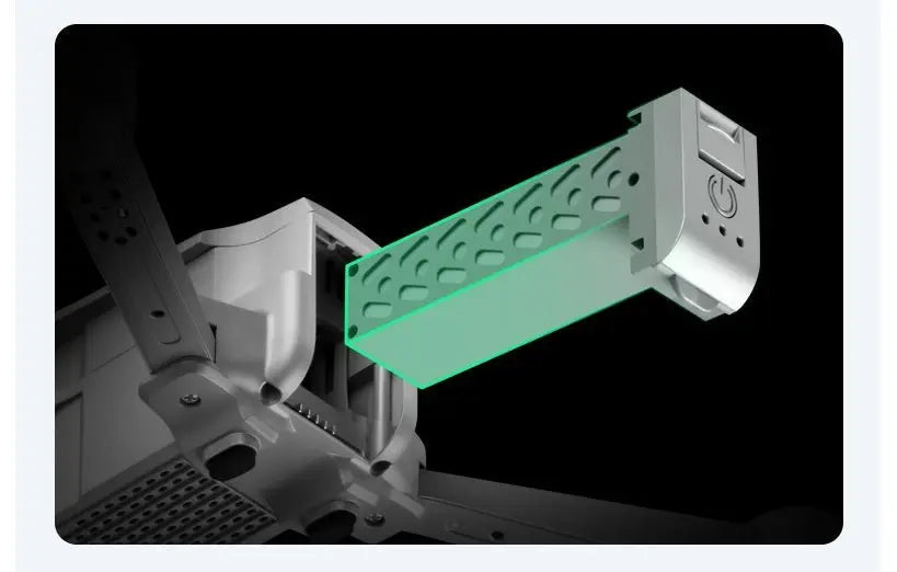 Close-up of folding drone battery compartment showing removable battery with power button and indicator lights