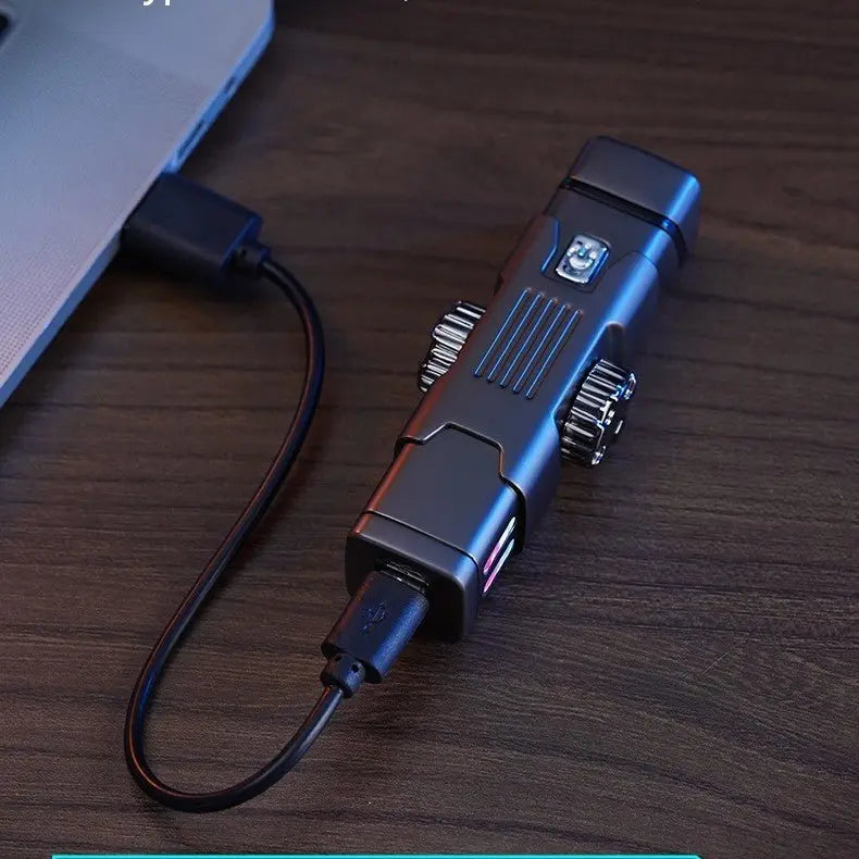 High-tech metallic black charging lighter connected to laptop with USB cable on wooden surface