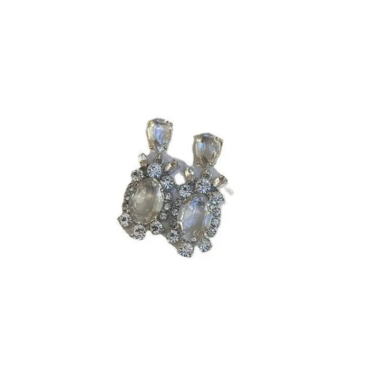 Close-up of Hot Girl H Lala Diamond personalized earrings with transparent silver electroplated metal and sparkling stones
