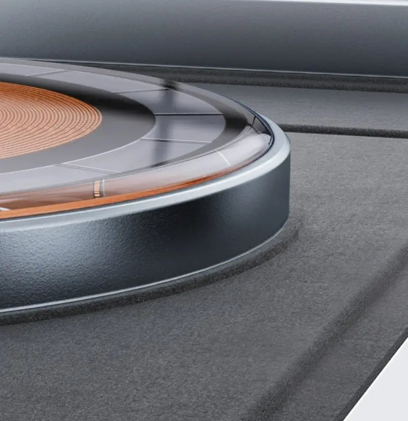 Close-up of Magsafe transparent magnetic wireless charger showing circular coil and sleek black casing detail
