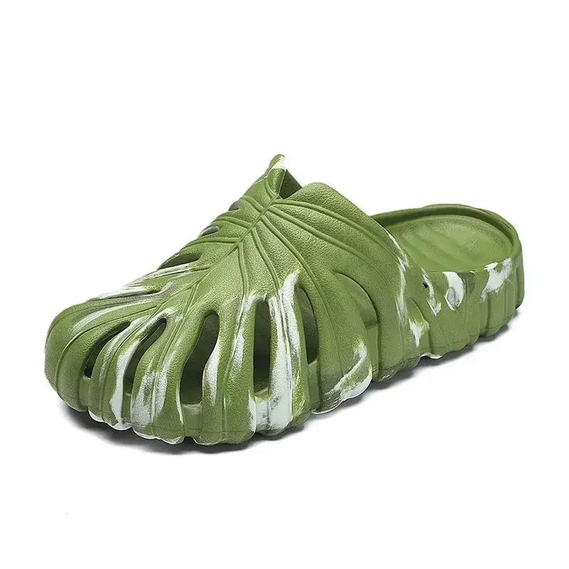 Green platform cloud slipper with monstera leaf cutout design and white accents, unisex soft outdoor slide sandal