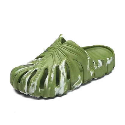 Green platform cloud slipper with monstera leaf cutout design and white accents, unisex soft outdoor slide sandal