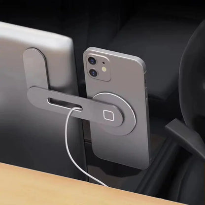 Metal Expansion Phone Stand attached to a laptop with magnetic folding phone holder and charging cable connected to phone