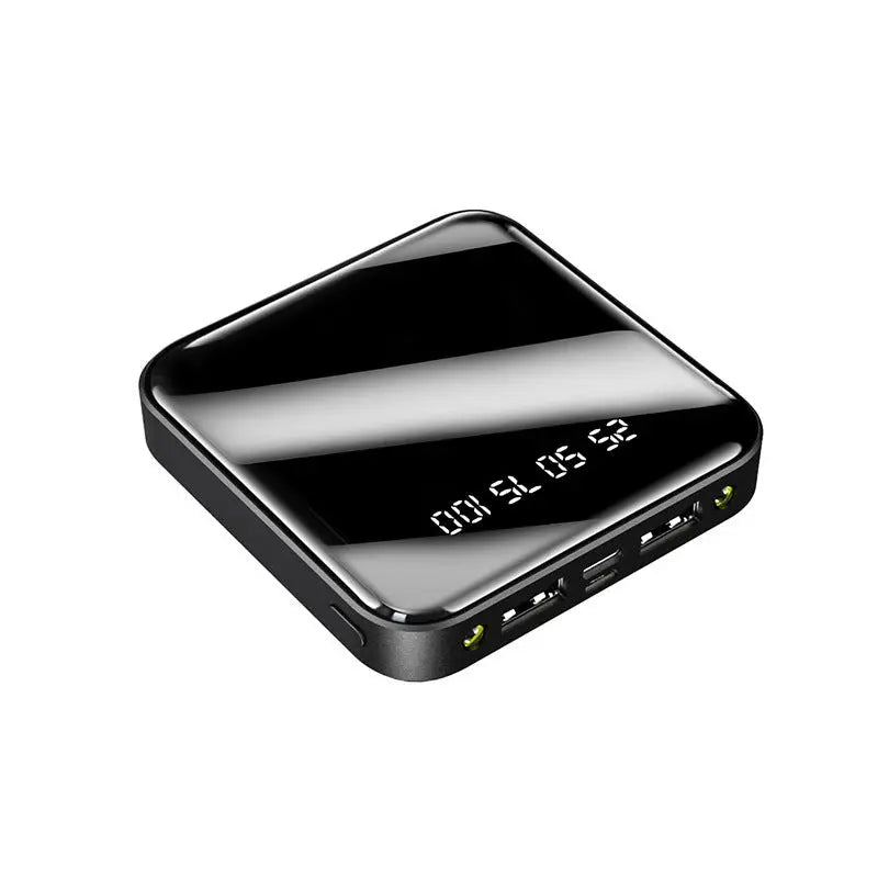 Compact black Mini Power Bank 20000 mAh with sleek mirror finish and digital LED display showing battery level