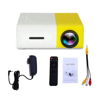 Front view of compact yellow and white mini projector with remote, power adapter, user guide, and AV cable accessories