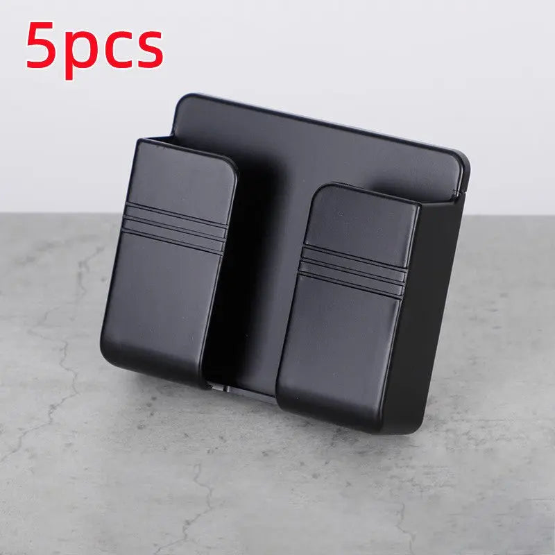 Black Mobile Phone Charging Storage Rack with dual compartments and punch-free sticky backing for organized cable management