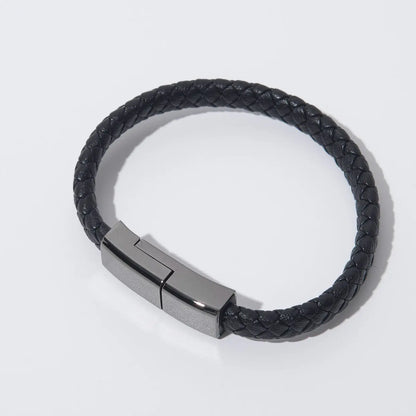 Black braided leather bracelet charger with sleek metallic USB charging clasp for iPhone and USB-C devices