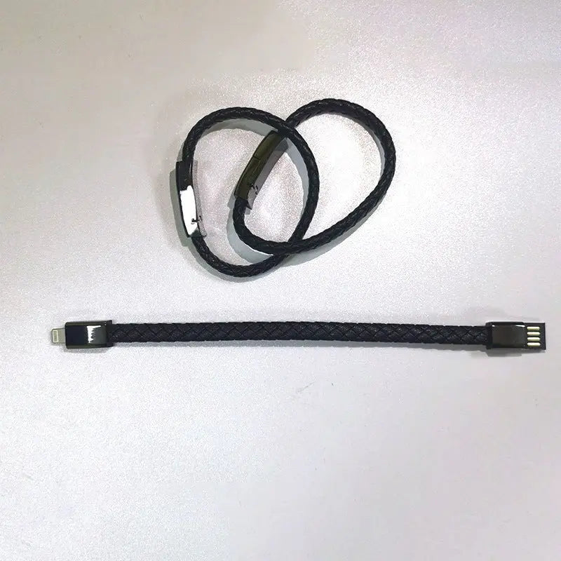 Black braided leather bracelet charging cable compatible with iPhone and USB devices shown coiled and straightened