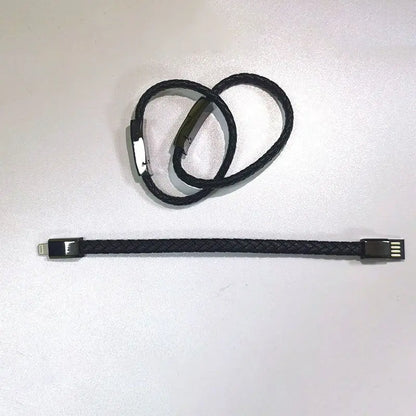 Black braided leather bracelet charging cable compatible with iPhone and USB devices shown coiled and straightened
