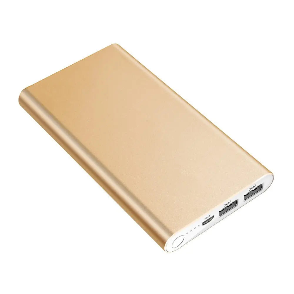 Gold ultra-thin aluminum alloy power bank with 12000mAh capacity and multiple USB charging ports shown angled view