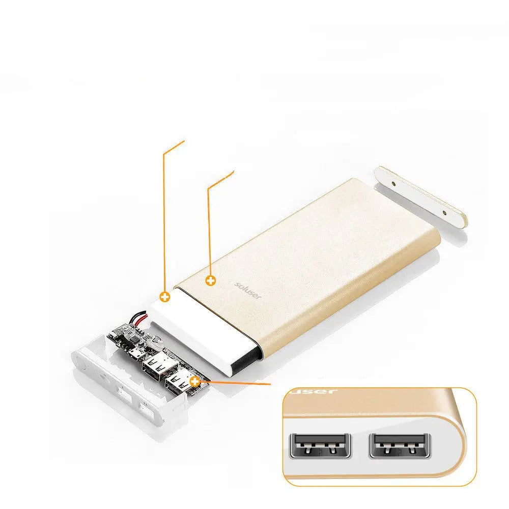 Disassembled view of gold ultra-thin aluminum alloy 12000mAh power bank showing internal components and dual USB ports close-up