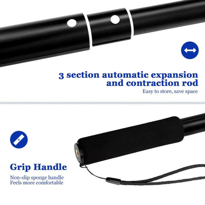 Close-up of retractable dog toy showing black three-section extendable rod and non-slip sponge grip handle with wrist strap