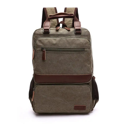 Front view of brown canvas laptop backpack with multiple zippered compartments and leather accents