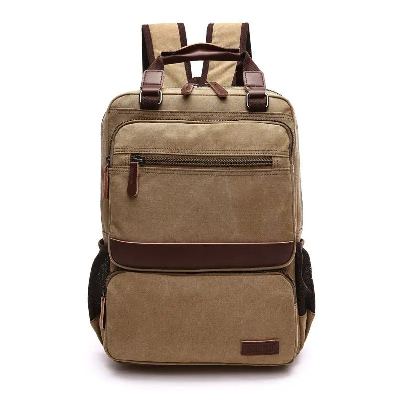 Front view of tan canvas laptop backpack with brown leather accents and multiple zippered compartments