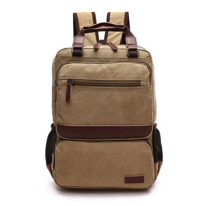 Front view of tan canvas laptop backpack with brown leather accents and multiple zippered compartments
