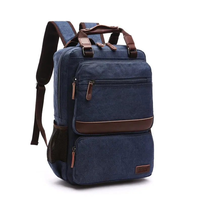 Front view of navy blue canvas laptop backpack with multiple zip pockets and brown leather accents