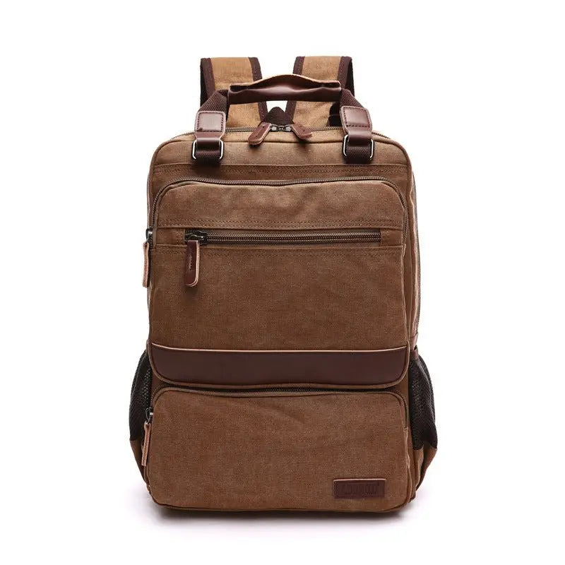 Front view of brown canvas laptop backpack with multiple zippered compartments and padded shoulder straps