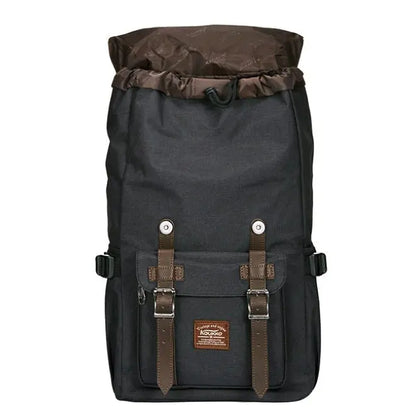 Front view of men's black linen oxford cloth backpack with brown soft handle and buckle straps