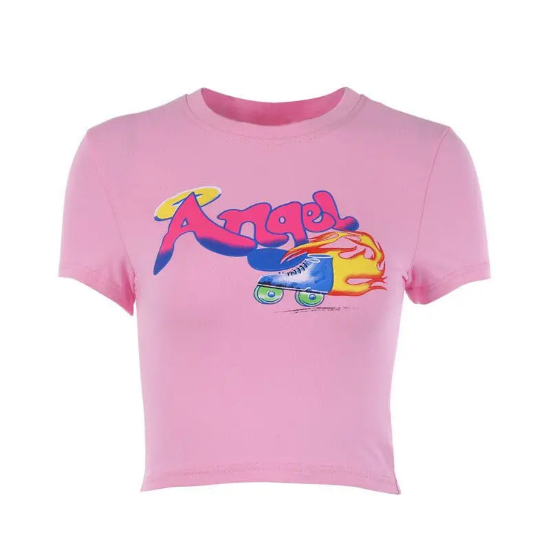 Front view of slim fit pink crop top with short sleeves featuring colorful "Angel" print and roller skate graphic