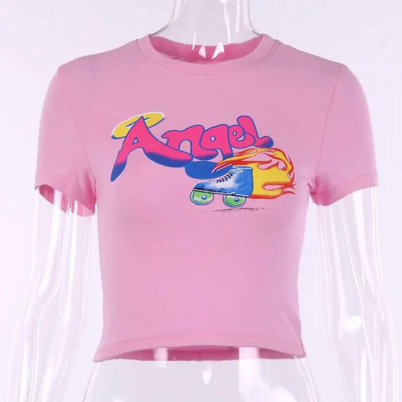 Front view of slim fit pink short sleeve crop top with round neck and colorful "Angel" roller skate print