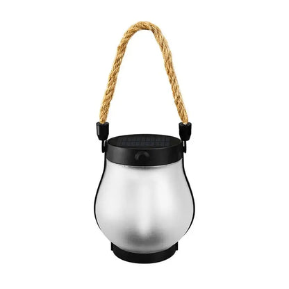 Solar Flame rechargeable outdoor hanging lantern with frosted body and hemp rope handle for garden and camping use