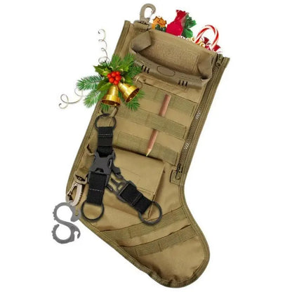 Khaki tactical molle Christmas stocking with gear loops, black straps, zipper pocket, and holiday decorations inside